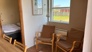 Postel nebo postele na pokoji v ubytování Søndervig Camping & Cottages