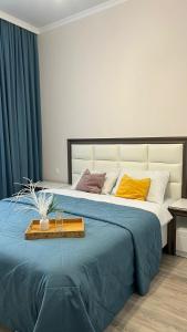 Postel nebo postele na pokoji v ubytování Квартира вблизи Керуен