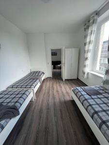 Postel nebo postele na pokoji v ubytování Apartments im Herzen von Velbert