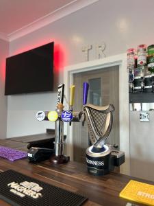 a trophy on top of a wooden desk at Tudor Rose Hotel in Blackpool
