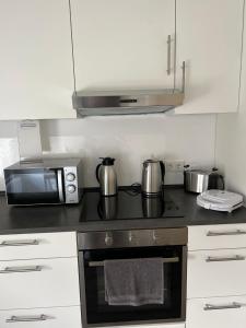Kuchyň nebo kuchyňský kout v ubytování Apartments im Herzen von Velbert