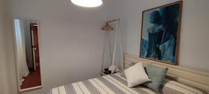 Ένα ή περισσότερα κρεβάτια σε δωμάτιο στο Apartamento Inocentes11