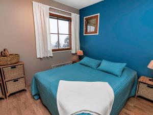 En eller flere senge i et værelse på Holiday Home Kesä-iikka 4 by Interhome