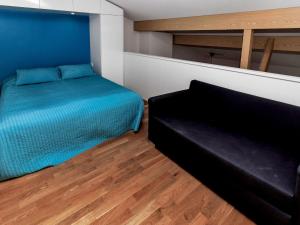 En eller flere senge i et værelse på Holiday Home Kesä-iikka 4 by Interhome