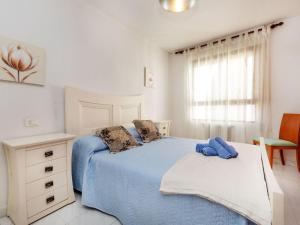 Ένα ή περισσότερα κρεβάτια σε δωμάτιο στο Apartment Paseo by Interhome