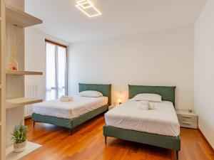 Postel nebo postele na pokoji v ubytování Apartment Platani by Interhome