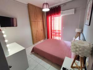A bed or beds in a room at Marlen House Chania