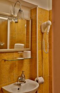 Koupelna v ubytování Hotel Noemi