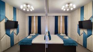 杜尚別的住宿－Hotel Tajikgrey Dushanbe，一间睡床上有鸭子的房间