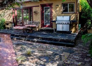 a house with a patio with a stove in front of it at NoHo Escape in Los Angeles
