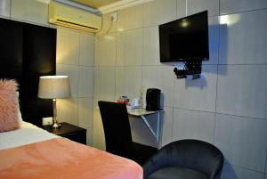 Μια τηλεόραση ή/και κέντρο ψυχαγωγίας στο Lapologa Bed & Breakfast