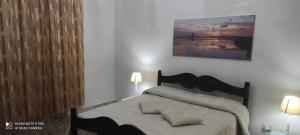 Posteľ alebo postele v izbe v ubytovaní appartamento zona centralissima trapani