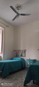 Posteľ alebo postele v izbe v ubytovaní appartamento zona centralissima trapani + 9 fotografií