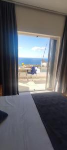 Postel nebo postele na pokoji v ubytování Ionian View