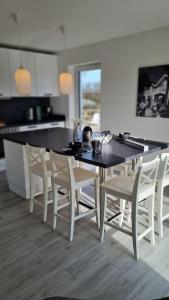 Gallery image of BADEBUDE 3 Ferienhaus im Hampton Style in Oldenburg in Holstein +28 photos