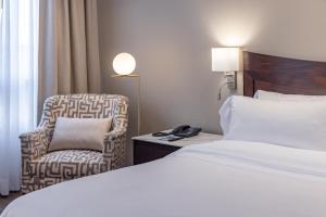 Postel nebo postele na pokoji v ubytování Hotel Biltmore