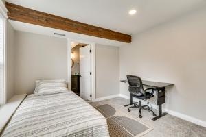 a bedroom with a bed and a desk at Portland Vacation Rental Near Parks and Downtown! in Portland