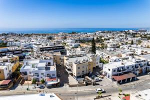 an aerial view of a city with the ocean at Ayia Napa Central Apartment by Ezoria Villas in Ayia Napa