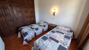 Un pat sau paturi într-o cameră la Bell Racó 33