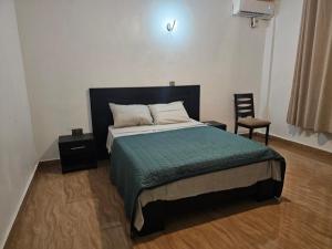 Postel nebo postele na pokoji v ubytování Au Bon Coin du Repos