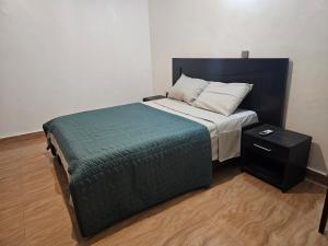 Postel nebo postele na pokoji v ubytování Au Bon Coin du Repos