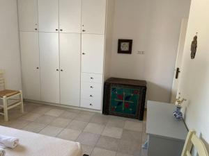 Postel nebo postele na pokoji v ubytování Cycladic home in Kounados Paros