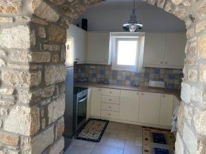 Kuchyň nebo kuchyňský kout v ubytování Cycladic home in Kounados Paros