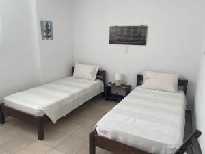 Postel nebo postele na pokoji v ubytování Cycladic home in Kounados Paros