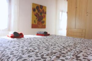 A bed or beds in a room at The History Apartment - Le Cà De Boron