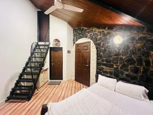 Achalaa Resort客房内的一张或多张床位
