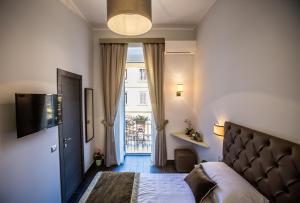 Televízia a/alebo spoločenská miestnosť v ubytovaní San Pietro Leisure and Luxury