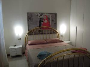 Postel nebo postele na pokoji v ubytování A DREAM ON THE LAKE Via Roma
