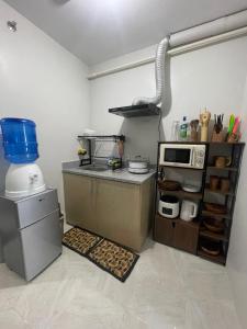 Kuchyň nebo kuchyňský kout v ubytování 2 BR Condo with wifi + 2 fotografie