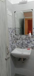 Koupelna v ubytování ARANYAK HOMESTAY entire bunglow