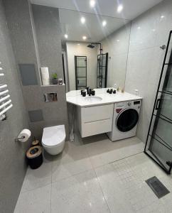 Et badeværelse på Apartment Targowa L11