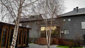 a building with a sign on the side of it at AQ-JAIYQ in Karagandy