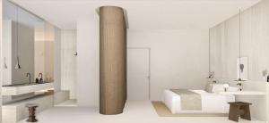 een witte badkamer met een bed en een wastafel bij Hotel Liautaud in Cassis