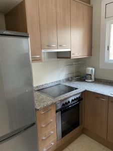 Kuchyň nebo kuchyňský kout v ubytování Apartamento con Feng Shui