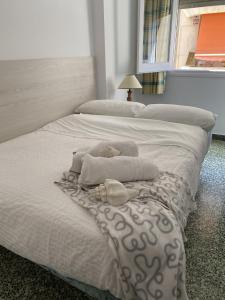 Postel nebo postele na pokoji v ubytování Apartamento con Feng Shui
