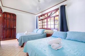 Postel nebo postele na pokoji v ubytování Marea Brava Villas