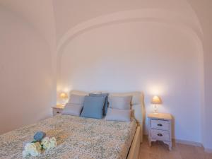 Posteľ alebo postele v izbe v ubytovaní Sardinia Family Villas - Villa Brunilde with private pool