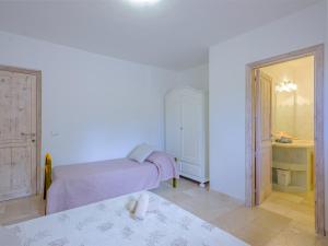 Posteľ alebo postele v izbe v ubytovaní Sardinia Family Villas - Villa Brunilde with private pool
