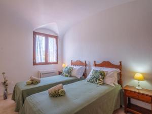 Posteľ alebo postele v izbe v ubytovaní Sardinia Family Villas - Villa Brunilde with private pool
