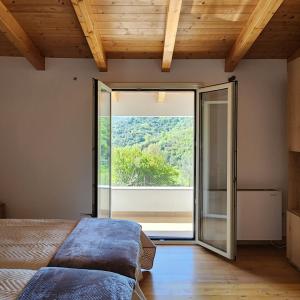 Postel nebo postele na pokoji v ubytování Uphill house.