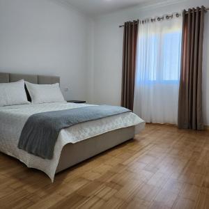 Postel nebo postele na pokoji v ubytování Uphill house.