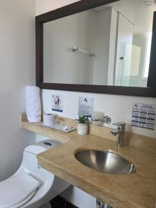 Koupelna v ubytování Hotel H53