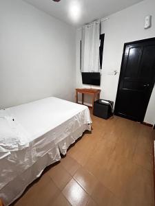 Postel nebo postele na pokoji v ubytování Pousada Matriz