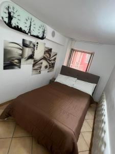 Casa Marisa Pozzuoli tesisinde bir odada yatak veya yataklar