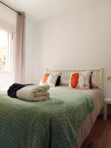 Ένα ή περισσότερα κρεβάτια σε δωμάτιο στο Madrid Homely Apartment