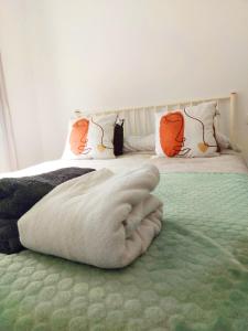 Ένα ή περισσότερα κρεβάτια σε δωμάτιο στο Madrid Homely Apartment +2 φωτογραφίες